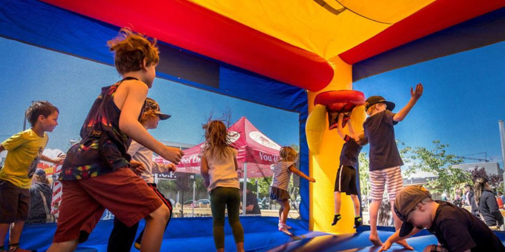 image of children in a bouncy castle